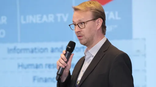 Philippe Keutgen speaking into a microphone